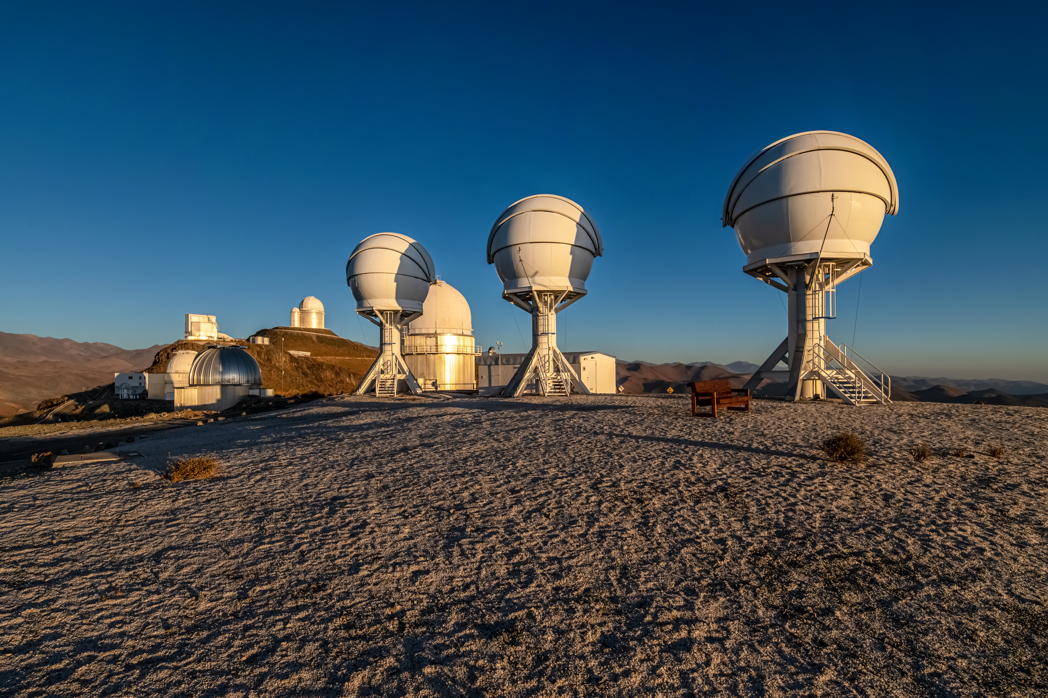 Shown in this image are the three telescopes of the BlackGEM array at ESO’s La Silla Observatory in Chile. The telescopes can quickly scan large areas of the sky to find a source that has emitted gravitational waves detected by LIGO and Virgo.