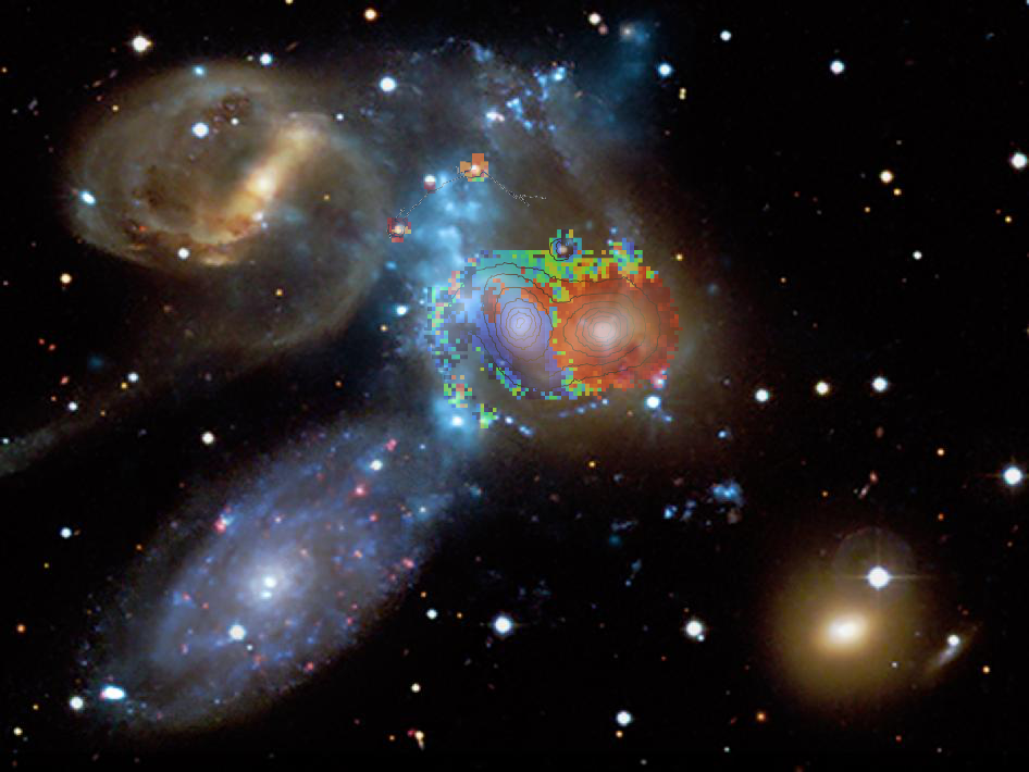In this image, the blue, green and red colours in the central part indicate speeds derived from the WEAVE spectra and are superimposed on an image of Stephan's Quintet composed of starlight (from the CFHT telescope) and X-ray emission from hot gas (bluish vertical diffuse band, from the Chandra X-ray Observatory). The speeds obtained by WEAVE indicate that the left-centred galaxy (NGC 7318b, painted blue) is entering the group from behind at about 800 km/s (almost 3 000 000 km/h). This high-speed collision wreaks havoc on NGC 7318b. Clouds of hydrogen gas —the fuel needed for the formation of new stars— are receding from the galaxy. This is likely to slow down the rate of new star formation in this galaxy. The WEAVE spectra will help to find out the fate of the expelled gas as it moves out into the space between the galaxies in the group. Credits: X-ray (blue): NASA/CXC/CfA/E. O'Sullivan, optics (brown): Canada-France-Hawaii-Telescope/Coelum, WEAVE LIFU: Marc Balcells.