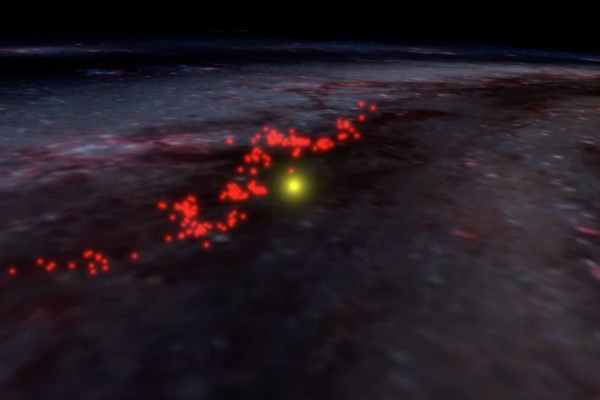 The Radcliffe wave. The clouds that comprise this structure are highlighted in red and superimposed on an artist's illustration of the Milky Way. The location of the Sun is highlighted by the yellow dot.