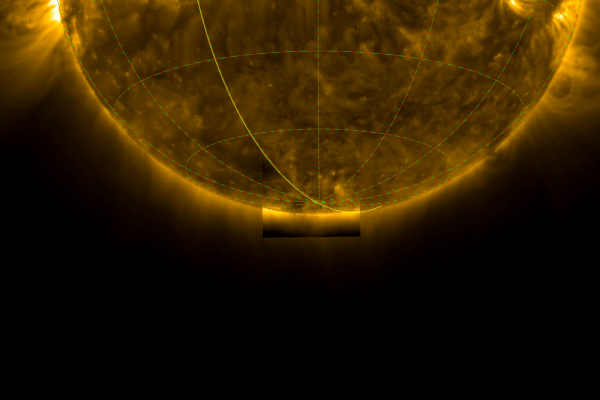 Photograph of the bottom half of the Sun, with a highlighted square region around the Sun's south pole. Taken in ultraviolet light, the image shows the hot gas in the Sun's outer atmosphere, the corona, glowing yellow as it extends outwards in threads and loops from the Sun.